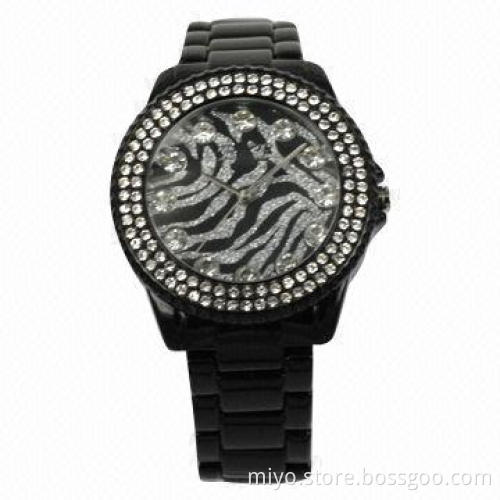 Ladies' fashion watch with stones on case and glitter on dial, fancy, stylish and nice